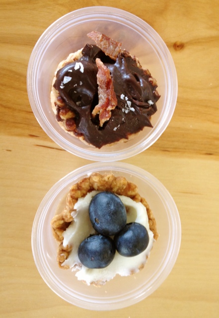 Mini chocolate/bacon and blueberry/lemon tarts at The Noble Pig